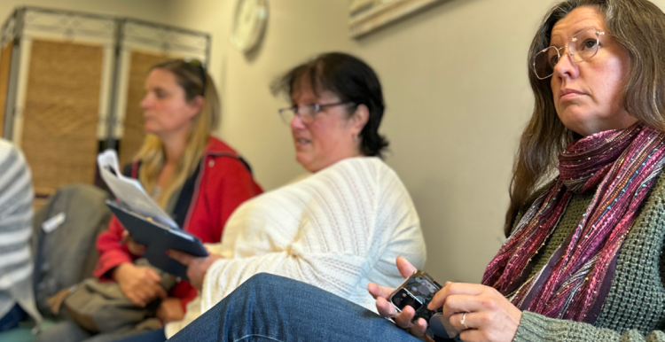 Three women at a mental health support group