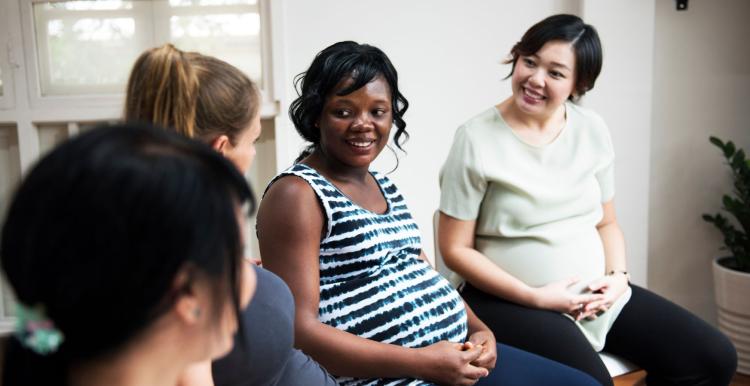 Pregnant women sitting down.jpeg Pregnant women sitting down.jpeg