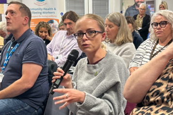 Person with lived experience of mental health speaking at the Mental Health Partnership Board