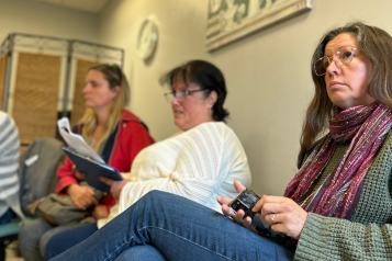 Three women at a mental health support group