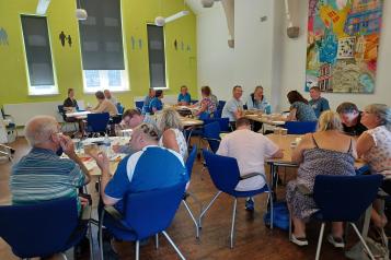 A board meeting in a room