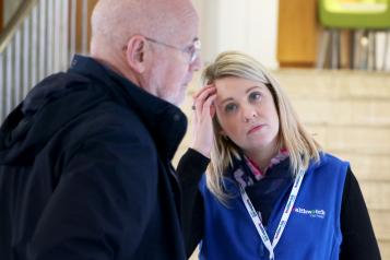 A woman from Healthwatch Cornwall speaking to the general public