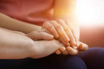 Carer looking after person after hospital discharge