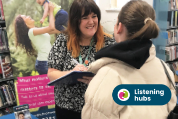 Sarah from our engagement team completing a survey with a member of the public
