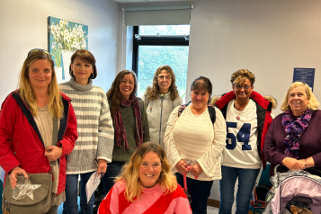 Group photo of a women's mental health support group