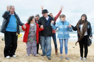 People with additional needs on a beach