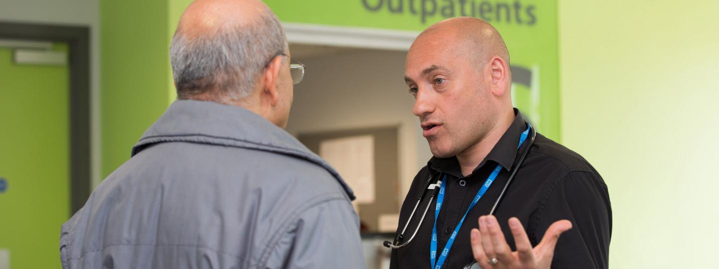 Doctor speaking to a patient in an outpatient clinic